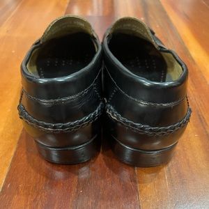 Johnston & Murphy handcrafted black tassel loafers.